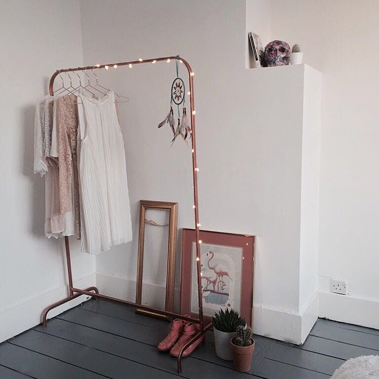 Fresh white bedroom with grey floorboards