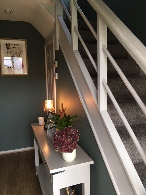 Green and white hall and stairs