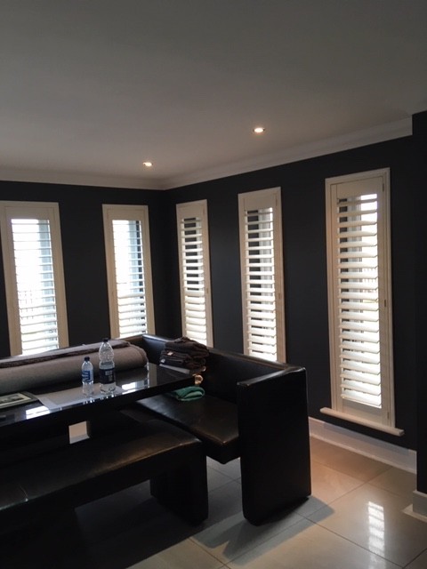 Monochrome sitting room with blinds