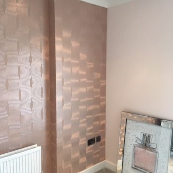 Peach rose gold wall effect